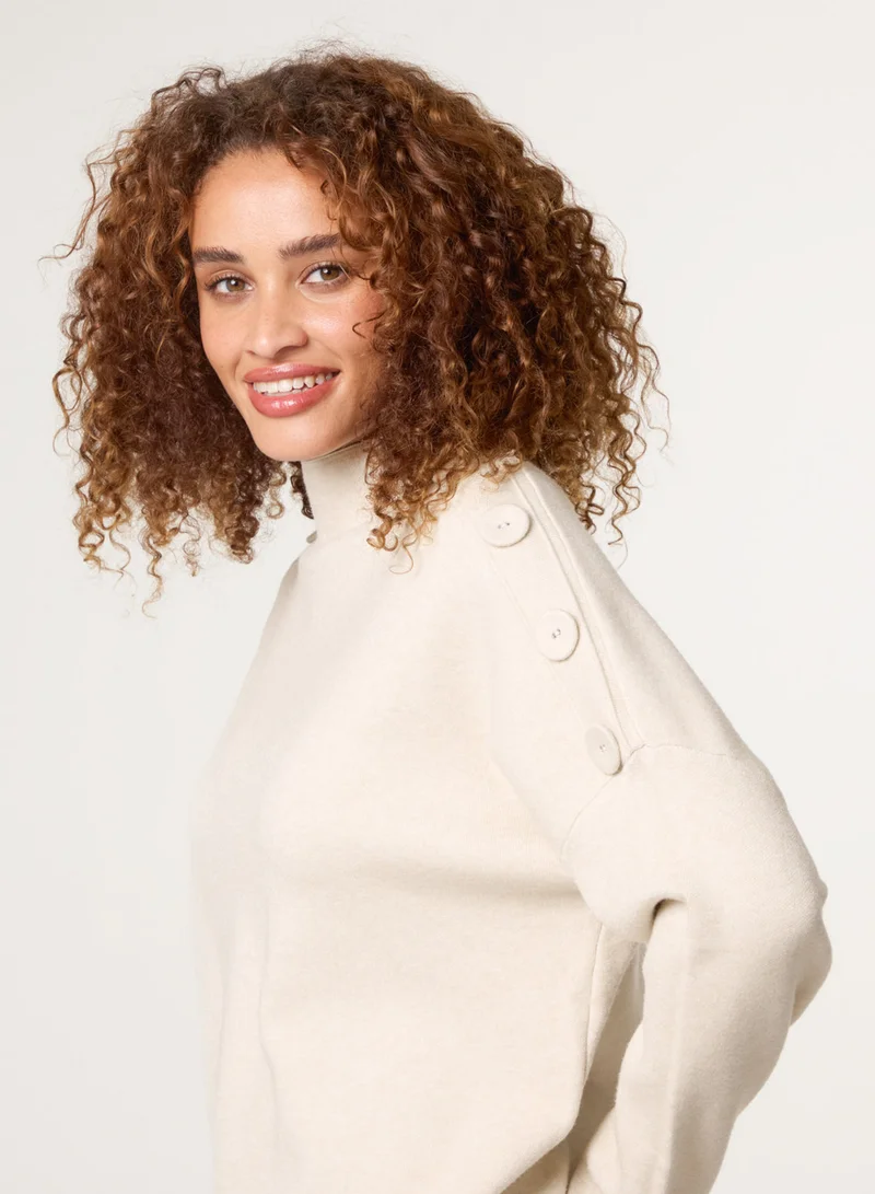 بلو فانيلا كنزة بكتف بأزرار