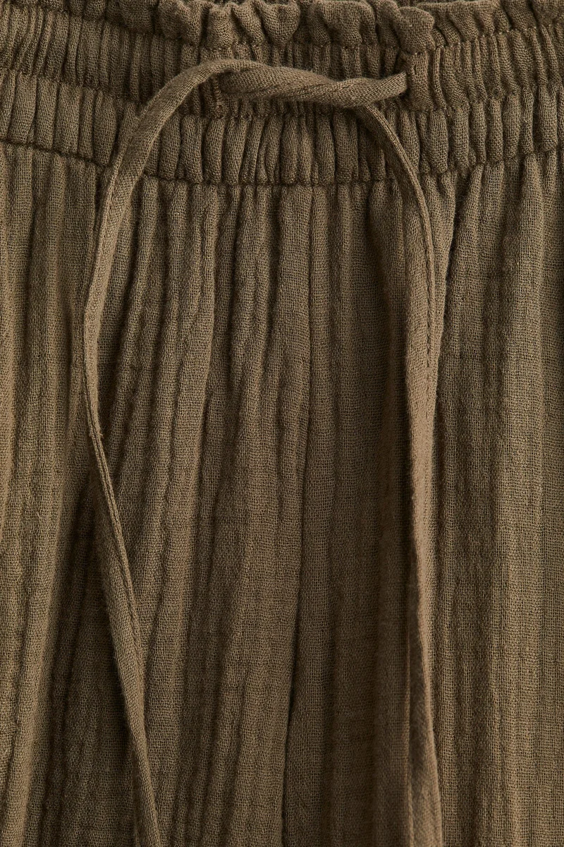H&M MAMA Wide muslin trousers
