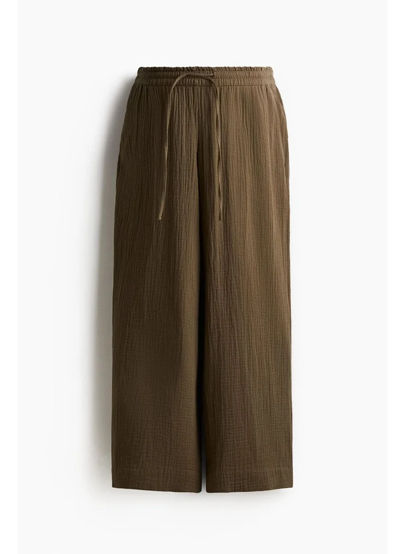 H&M MAMA Wide muslin trousers
