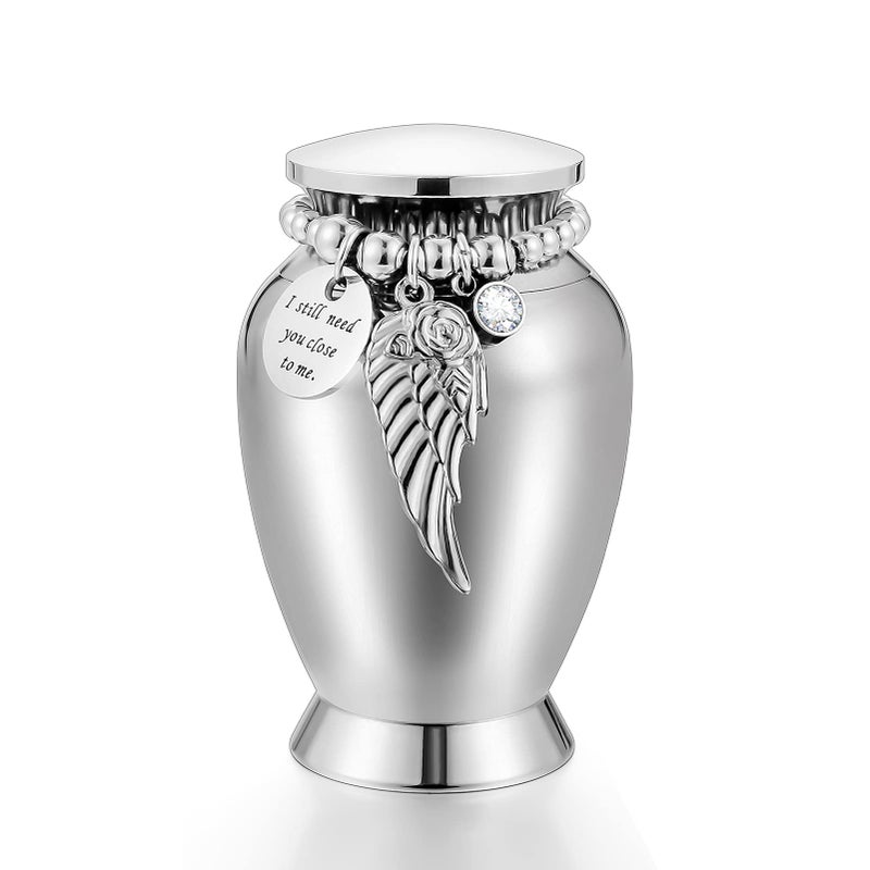 Small Keepsake Urns for Memorial Human Ashes 285 Inch with Wing Charm Mini Cremation Urns Stainless Steel