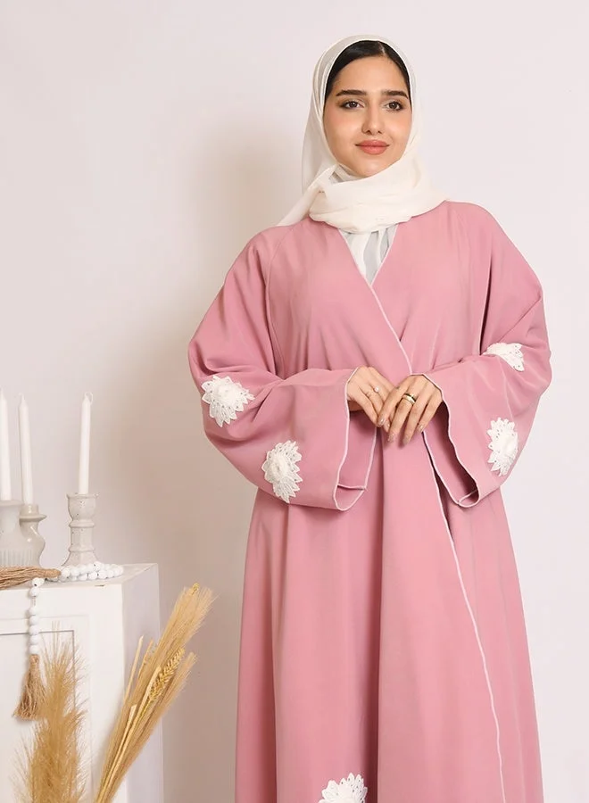 HAWRAA ABAYA Pink flared abaya with wide sleeves, adorned with white lace floral details