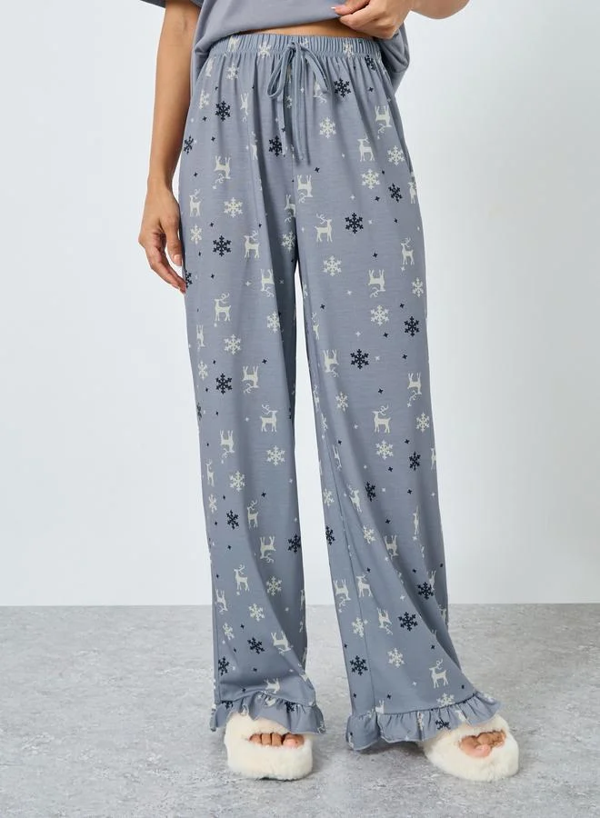 Styli  Styli Reindeer Pocket T-Shirt and Ruffle Hem Pyjama Set for Women | Best Price UAE