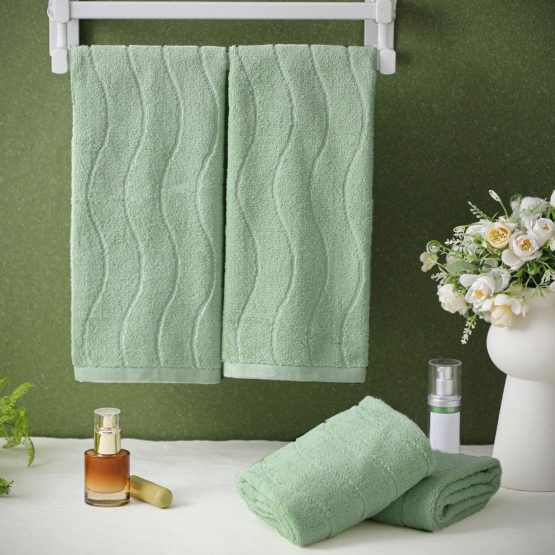 VitalCozy مجموعة مناشف يد من فيتال كوزي مكونة من 4 قطع، بنقشة جاكار مموجة ومخططة، مقاس 14 × 29 بوصة، مصنوعة من القطن بنسبة 100%، ناعمة وماصة، مثالية لتزيين الحمام والمطبخ، هدية رائعة للمناسبات (لون أخضر فاتح). - Image 1