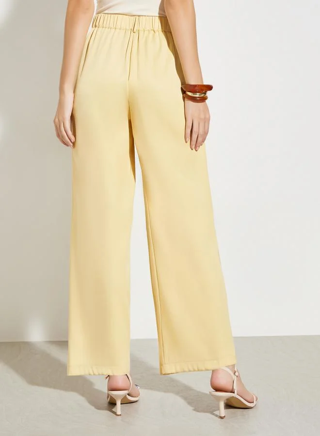 Styli Yellow Yellow Pleated Wide Leg Trousers for Women | Best Price UAE