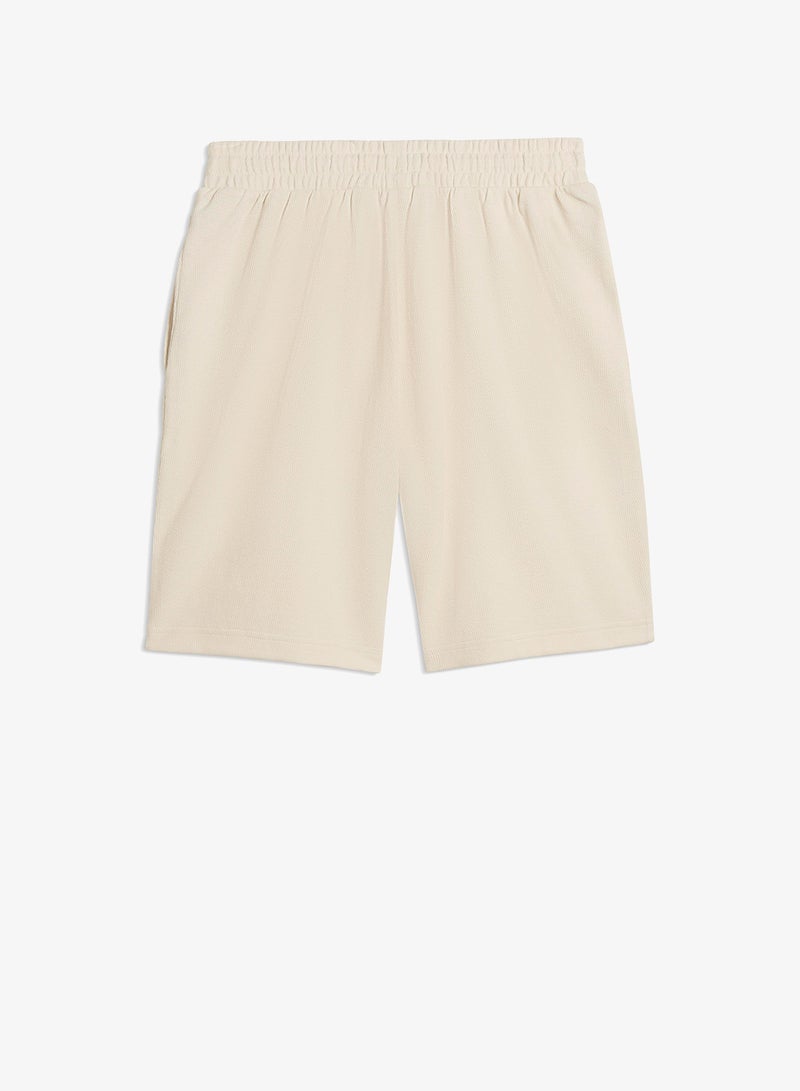 PUMA 9" Essential Elevated Relaxed Shorts - Image 5
