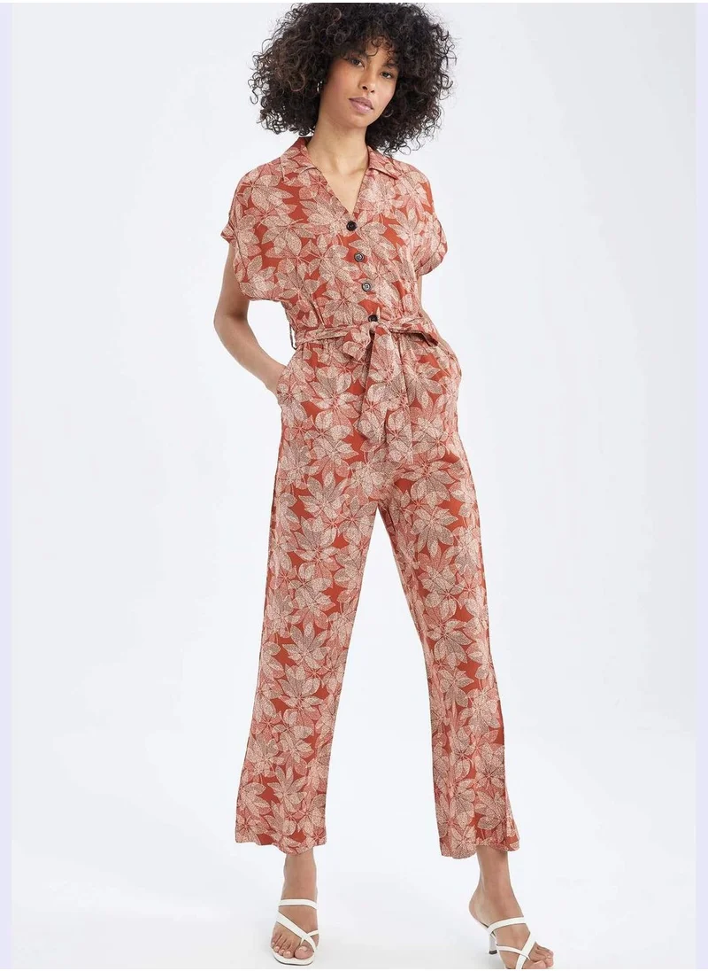 ديفاكتو Patterned Short Sleeve Belted Jumpsuit