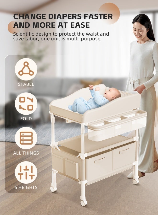 سوفت تاتش طاولة تغيير حفاضات الأطفال القابلة للطي مع عجلات، منظم لغرفة الأطفال حديثي الولادة، طاولة تغيير ملابس مع رف تخزين، هيكل معزز وارتفاع قابل للتعديل (بيج) - Image 3