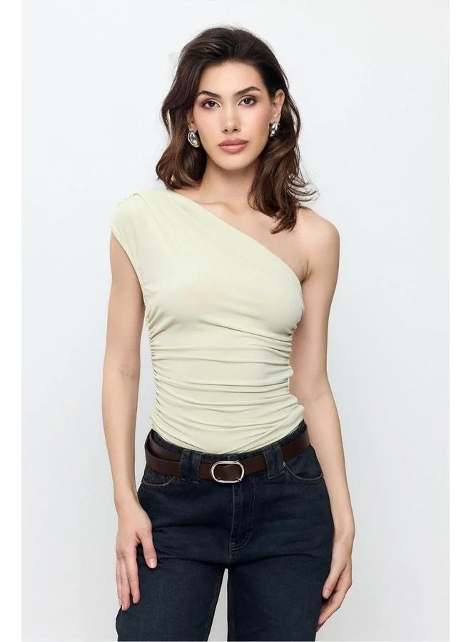 Sherin Green One-Shoulder Blouse.