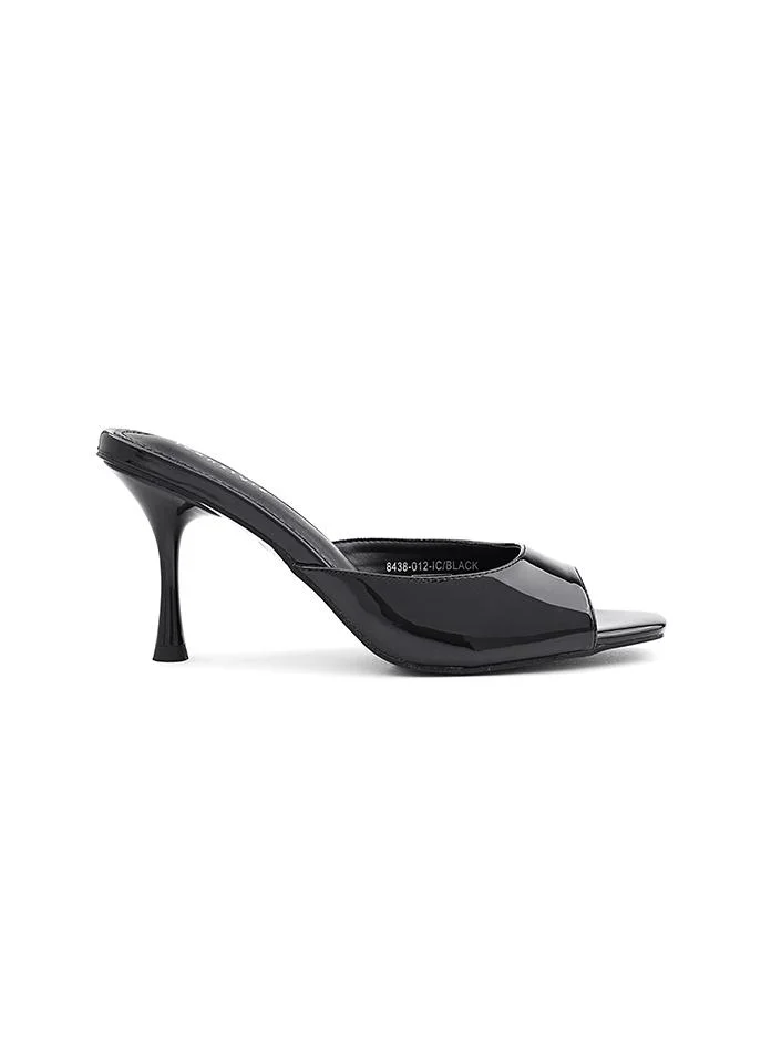 IconStyle Minimal heel slipper with a smooth finish and balanced heel.