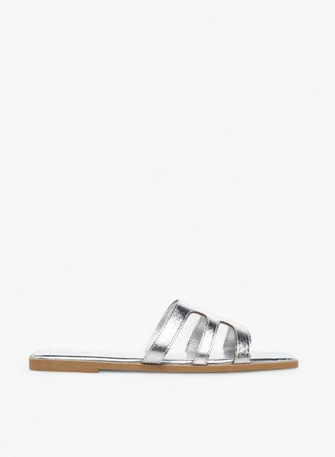 سيليست صنادل مسطحة نسائية بنقوش مقصوصة