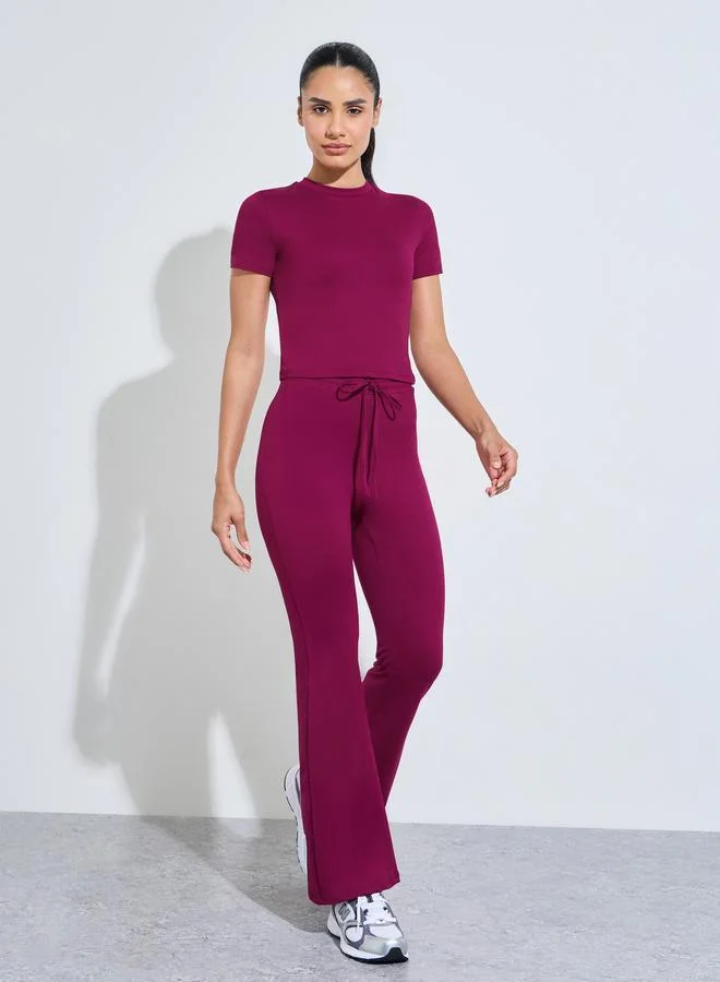 Burgundy Solid Fitted T-Shirt And Flared Pants Active Set