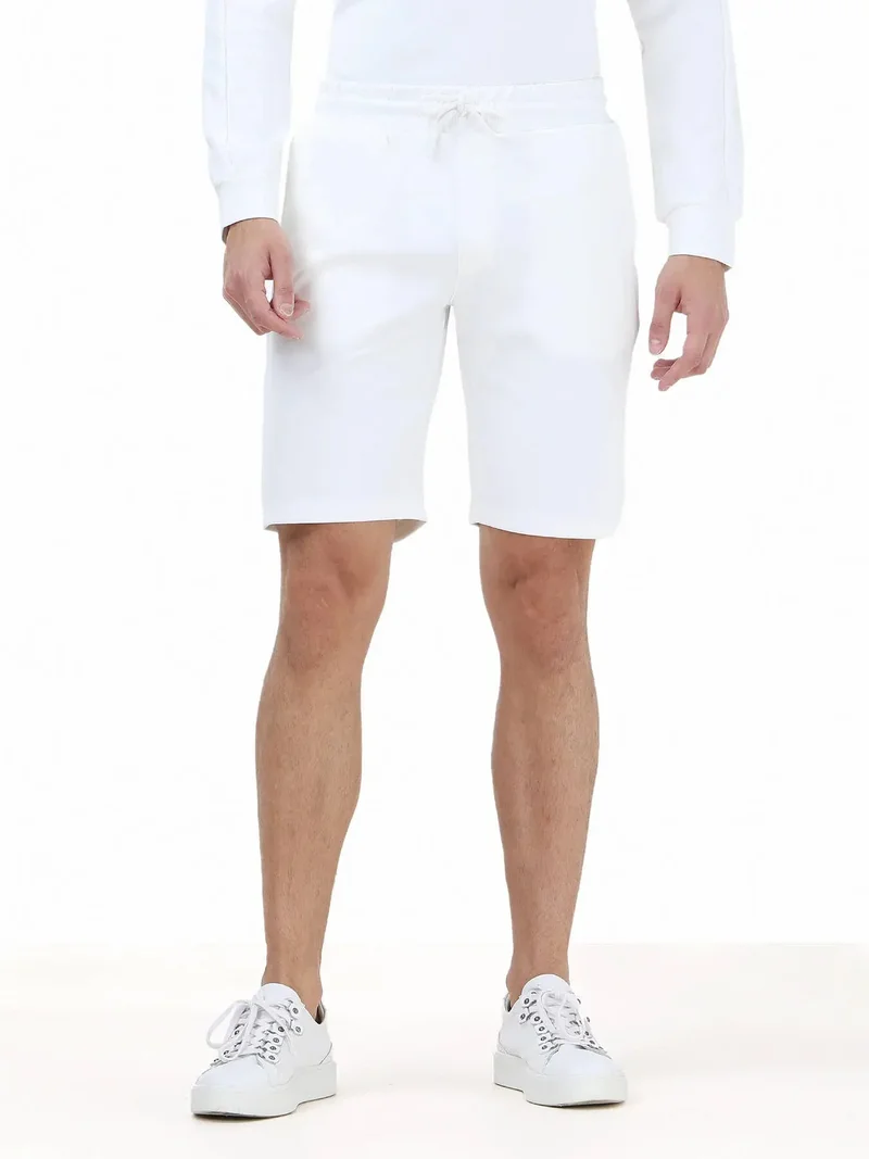 كيب شورت رياضي محبوك بلون بيج فاتح مناسب للجري والركض