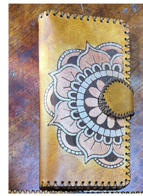 Handmade Women’s Leather Wallet – With fixed-color laser engraving for a vibrant and lasting artistic touch.  ✔️ 100% genuine leather ✔️ Color-fixed laser-engraved patterns – no fading or peeling ✔️ 7 card slots ✔️ 2 photo holders ✔️ 6 large compartments for phone or bills ✔️ 1 secure zip pocket ✔️ Magnetic flap closure 📏 Size: 9×20 cm ✔️ Luxurious velvet inner lining  🧵 Premium handmade craftsmanship 🎯 Functional, stylish, and long-lasting 🛡️ Includes warranty & reliable after-sale support  🎁 A perfect gift for women who appreciate elegance and uniqueness  #WomensWallet #LaserEngraved #ColorFixedDesign #HandmadeLeather #GenuineLeather #Fashion2025 #ElegantWallet #EgyptianCraftsmanship