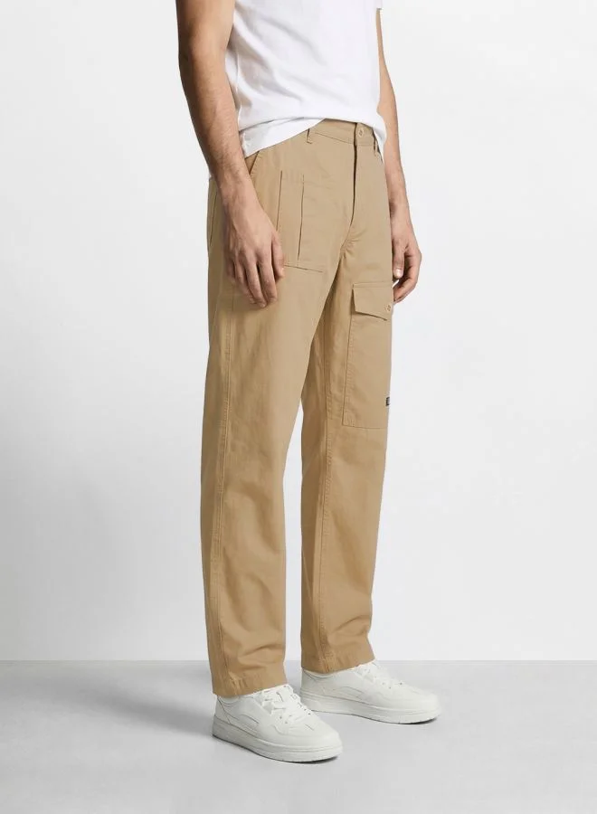 ذا انديان كراج كو Men Relaxed Fit Solid Side Pocket Mid-Rise Trousers