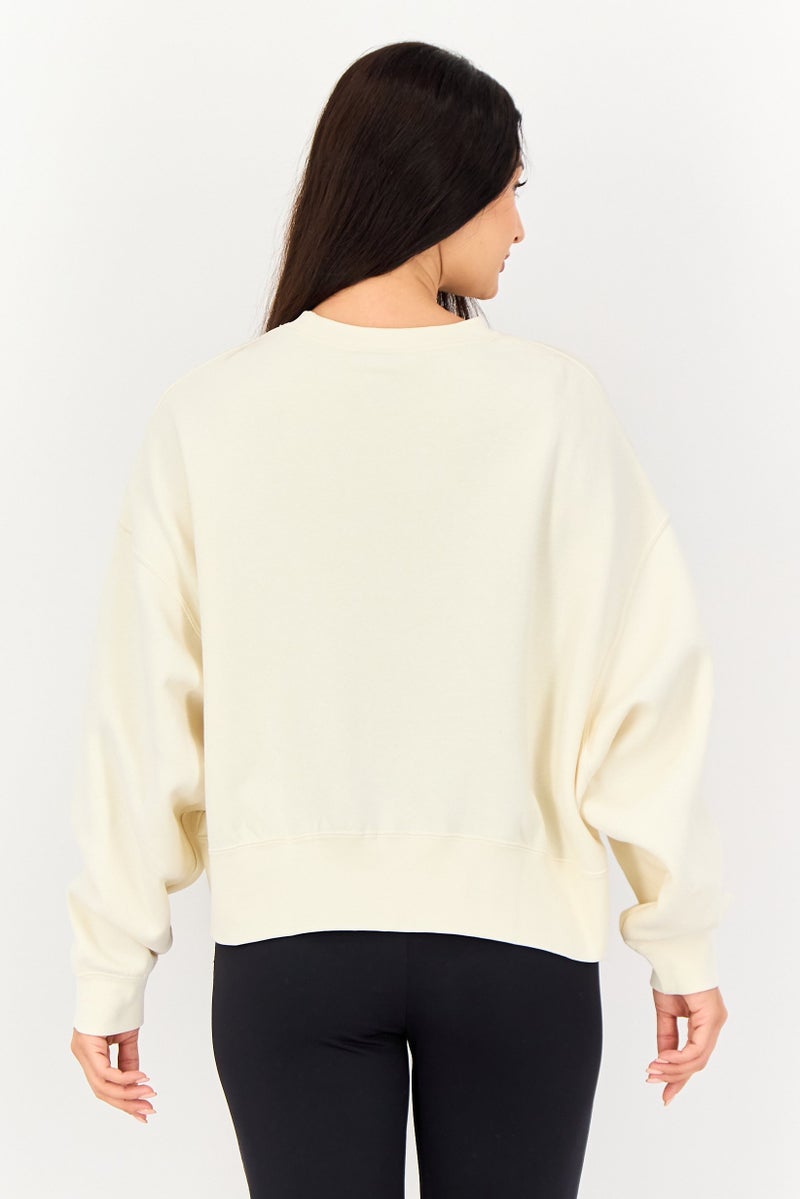 Nike سويت شيرت نسائي فضفاض بأكمام طويلة للخارج، كريمي - Image 2