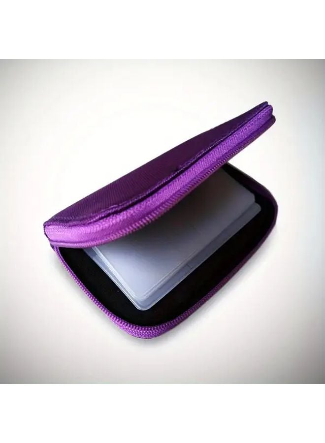 حافظة بطاقة الذاكرة الأرجوانية المحمولة مع إغلاق سحاب آمن وتصميم مدمج للسفر - Image 1