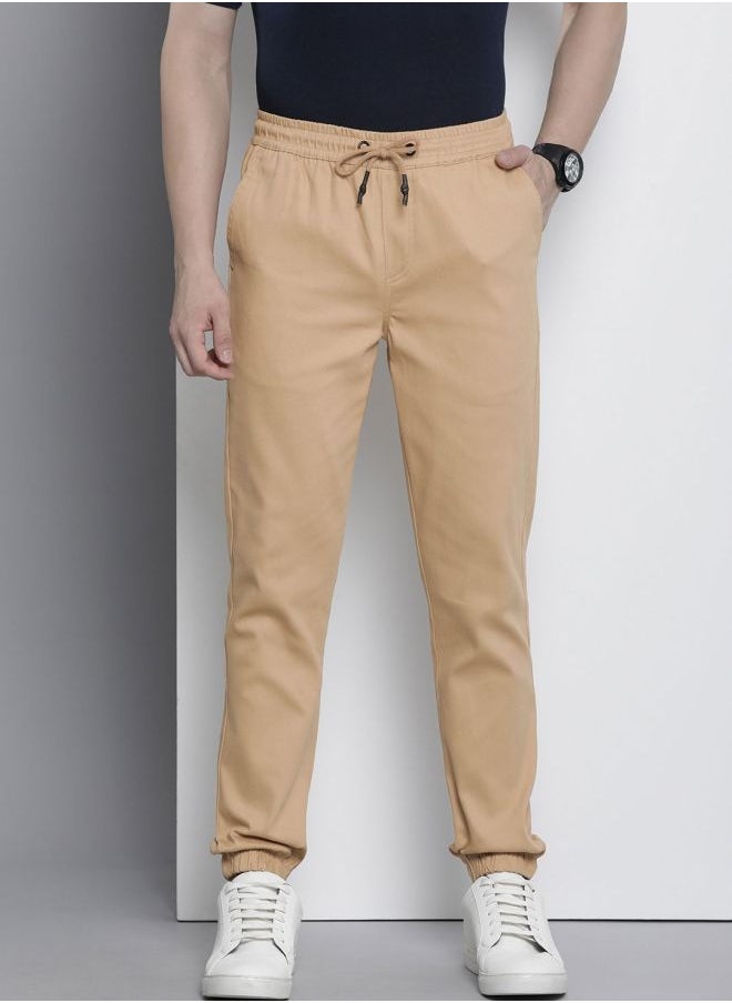 The Indian Garage Co Men Slim Fit Solid Mid-Rise Stretchable Chino Joggers  - Image 1
