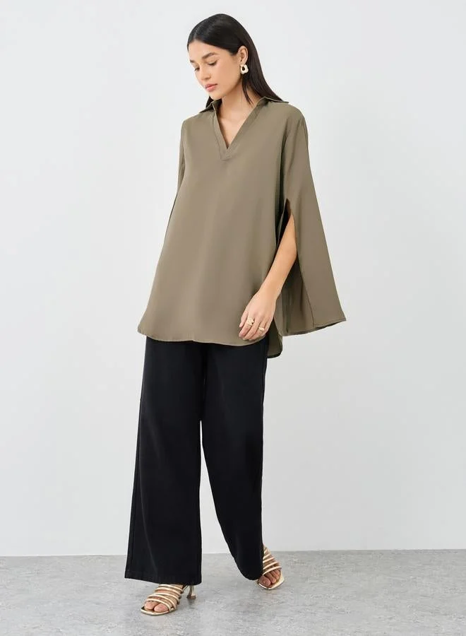 ستايلي قميص نسائي واسع بأكمام مشقوقة باللون البني