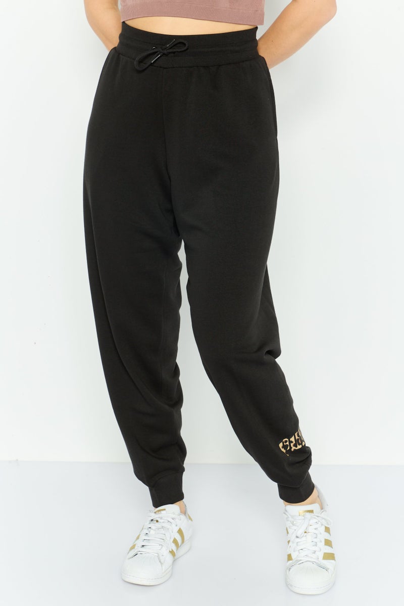 PUMA Women Sportswear Fit Training Jogger Pants, Black  - Image 1