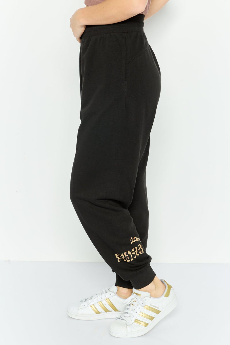 PUMA Women Sportswear Fit Training Jogger Pants, Black  - Image 3