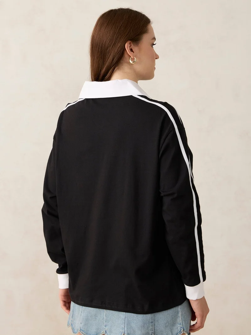 OUTZIDR  Black Varsity Graphic T-Shirt for Women | Best Price UAE