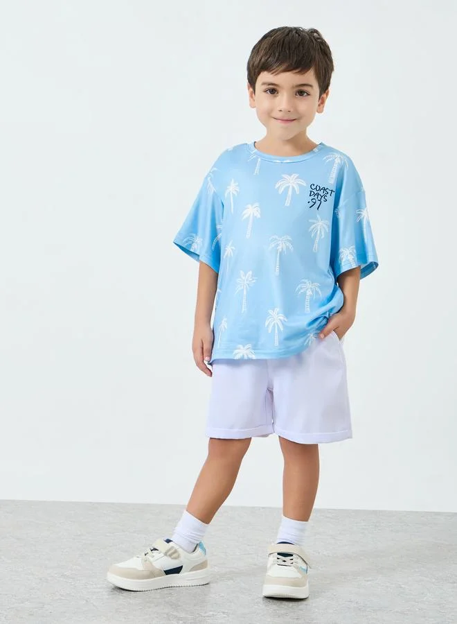 Styli Boys All-Over Palm Print Oversized T-Shirt with Text Emrboidery