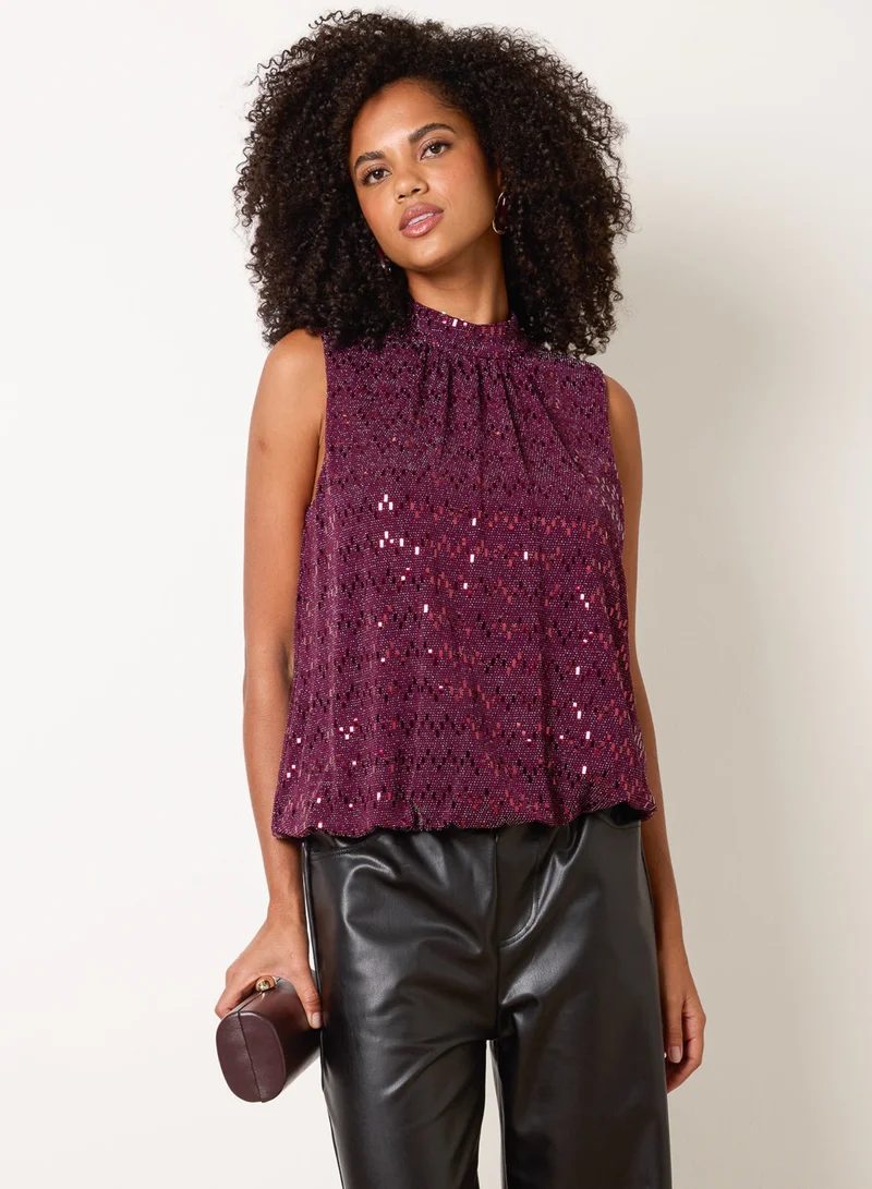 بلو فانيلا High Neck Metallic Puff Ball Blouse
