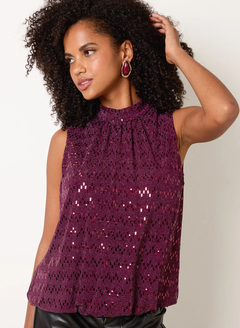 بلو فانيلا High Neck Metallic Puff Ball Blouse