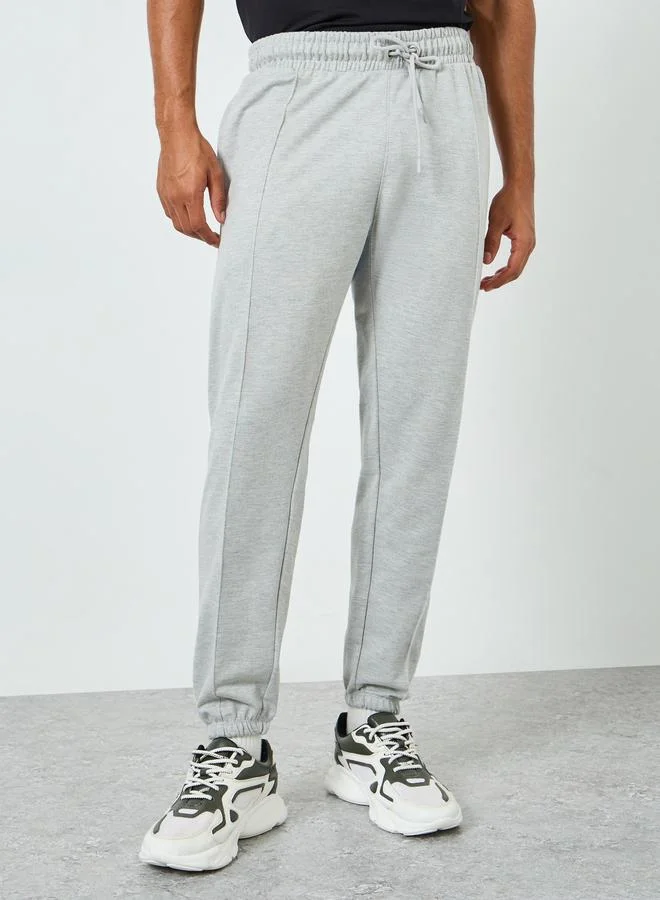 Men Grey Solid Joggers with Pintuck Detail
