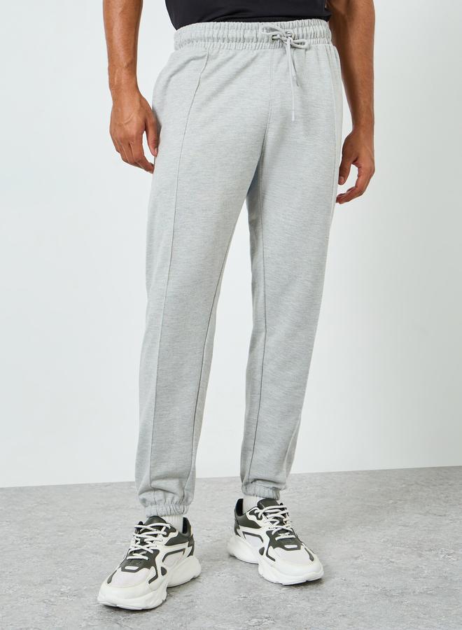 Styli Men Grey Solid Joggers with Pintuck Detail - Image 1
