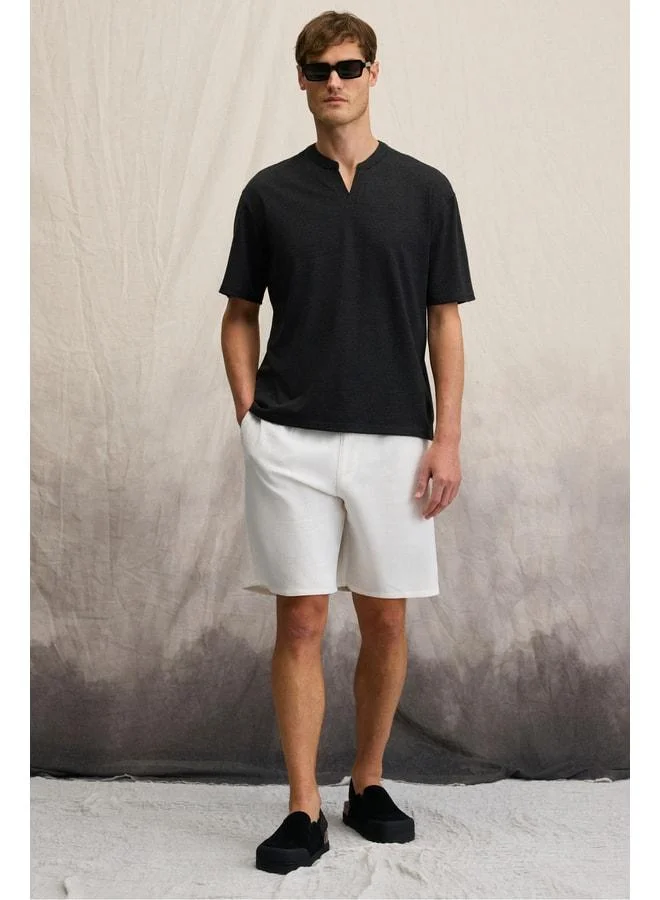 GRIMELANGE TUOMO Men's Mandarin Collar Short Placket Short Sleeve Relaxed Fit Black T-Shirt.