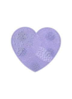 Miniso A heart-shaped silicone brush cleaning mat with a suction cup for easy cleaning of makeup brushes. 