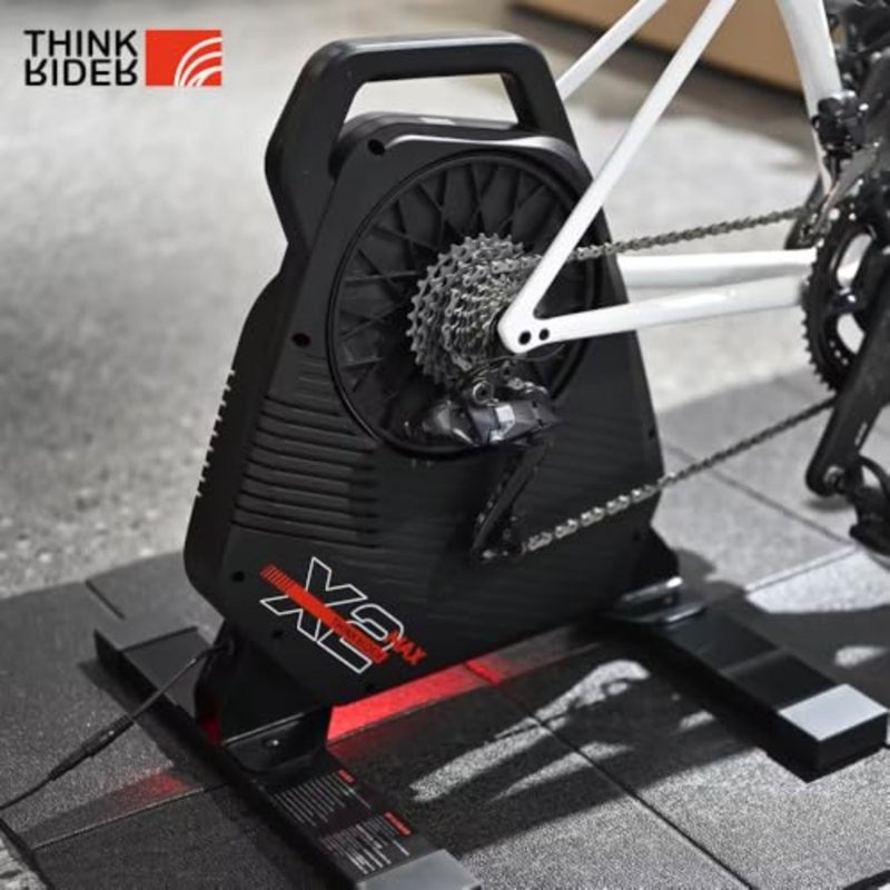 Smart trainer for indoor cycling, carbon fiber reinforced polymer, black, foldable design with real-time power and cadence tracking - Image 5