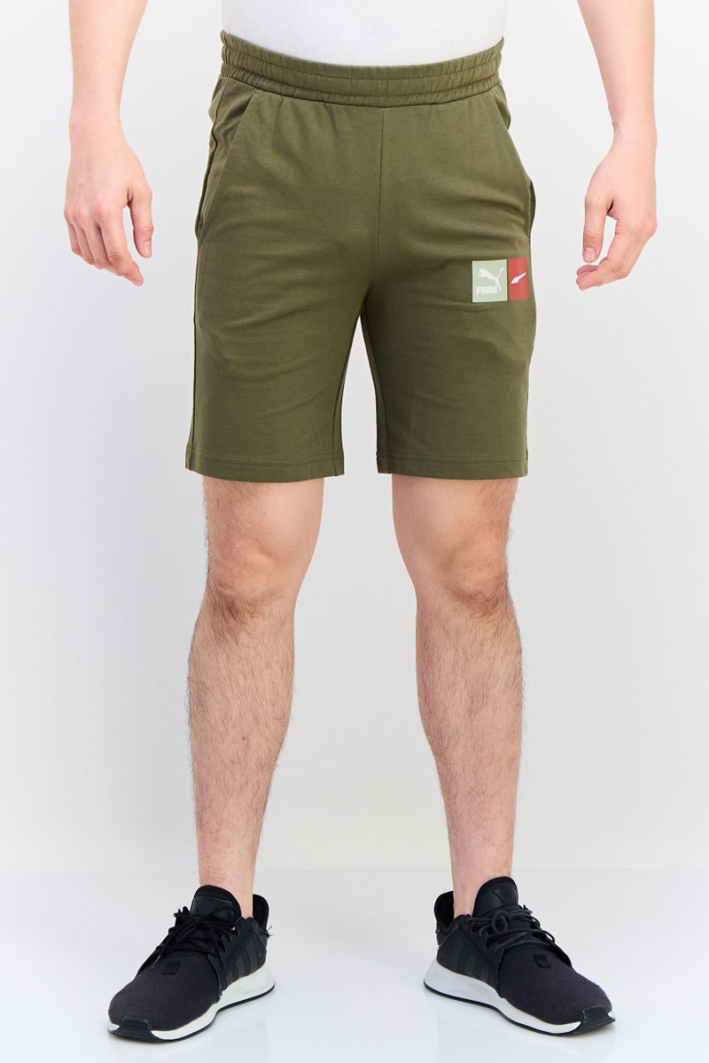 PUMA Men Sportswear Fit Outdoor Shorts, Olive - Image 1