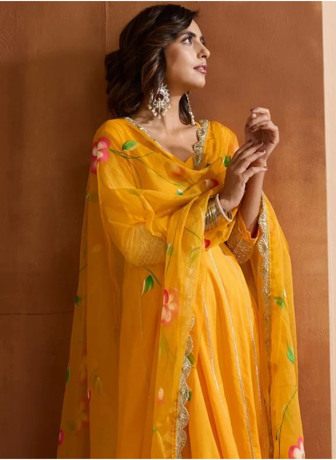 ISHIN Yellow Women Yellow Cotton Kurta Set with Embroidered pattern Tunic and Palazzo features a Round neckline and Three-Fourth Sleeve secured with Elastic closure and styled in Straight Fit ideal for Festive moments — designed to make heads turn.