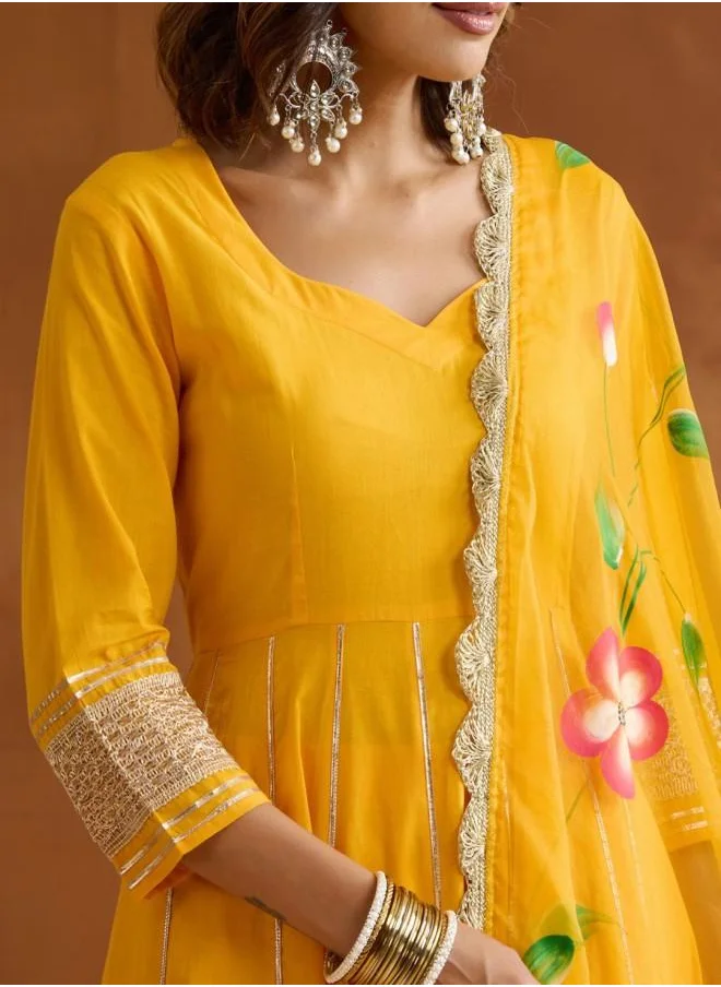 ISHIN Yellow Women Yellow Cotton Kurta Set with Embroidered pattern Tunic and Palazzo features a Round neckline and Three-Fourth Sleeve secured with Elastic closure and styled in Straight Fit ideal for Festive moments — designed to make heads turn.