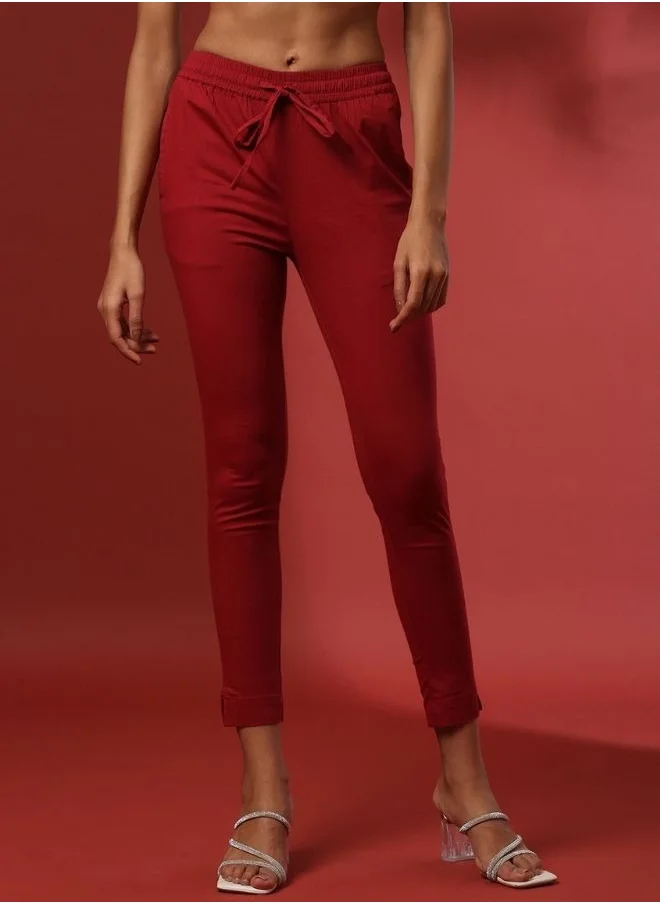 أبهشتي Fitted narrow  stretch pants with slits- red