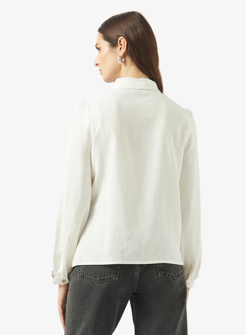 ايلا قميص بأزرار وطبعة حدود