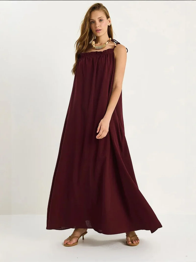 بيانكو لوتشي فستان ماكسي لوكسي بتفاصيل مكشكشة