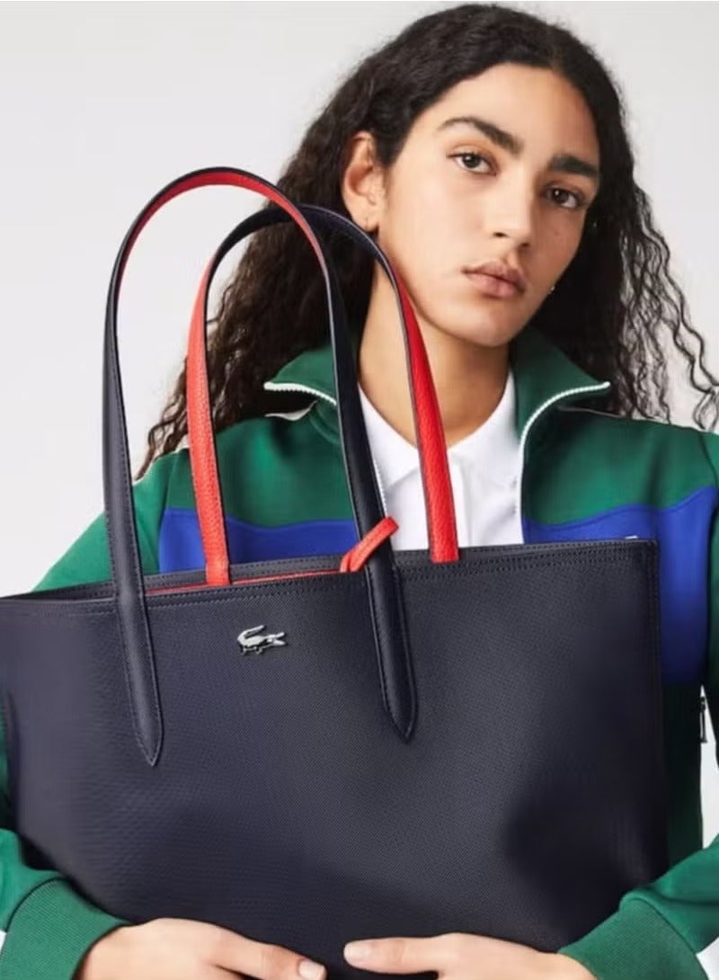 حامل حقيبة يد متعددة الأغراض من طراز Lacoste
