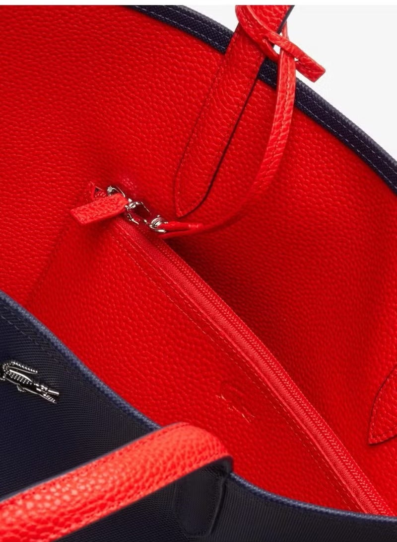 حامل حقيبة يد متعددة الأغراض من طراز Lacoste
