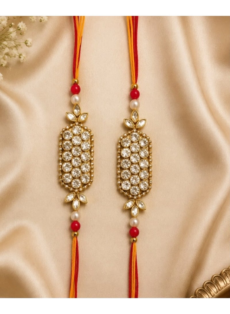 Gold-Toned Stone Embellished Bhai Rakhi Set with Red and Yellow Thread (Set of 2) - Image 1