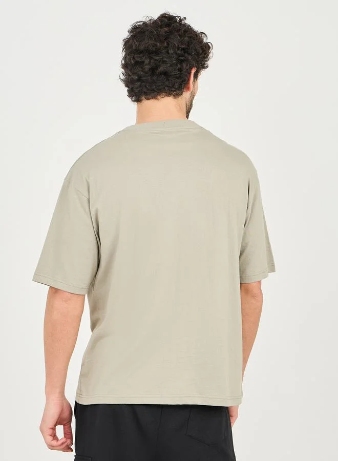 Styli Limitless Minimal Embossed Print Oversize Cotton T-Shirt