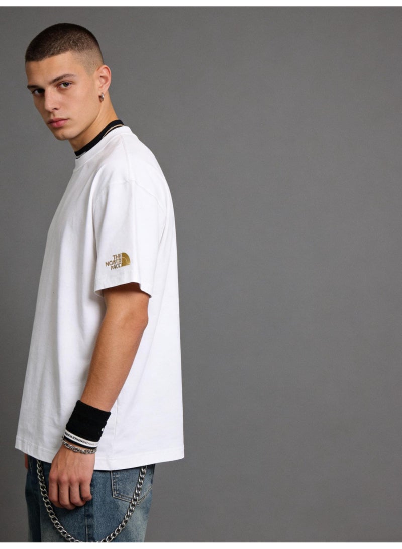 ذا نورث فيس Men's and women's T-shirts with the same style in the north face, high-grade cotton loose short sleeves with golden logo, retro street clothes for men and women. - Image 5