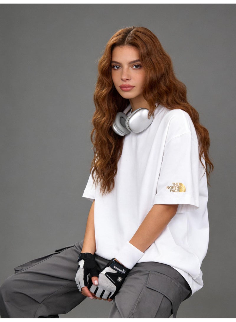 ذا نورث فيس Men's and women's T-shirts with the same style in the north face, high-grade cotton loose short sleeves with golden logo, retro street clothes for men and women. - Image 1