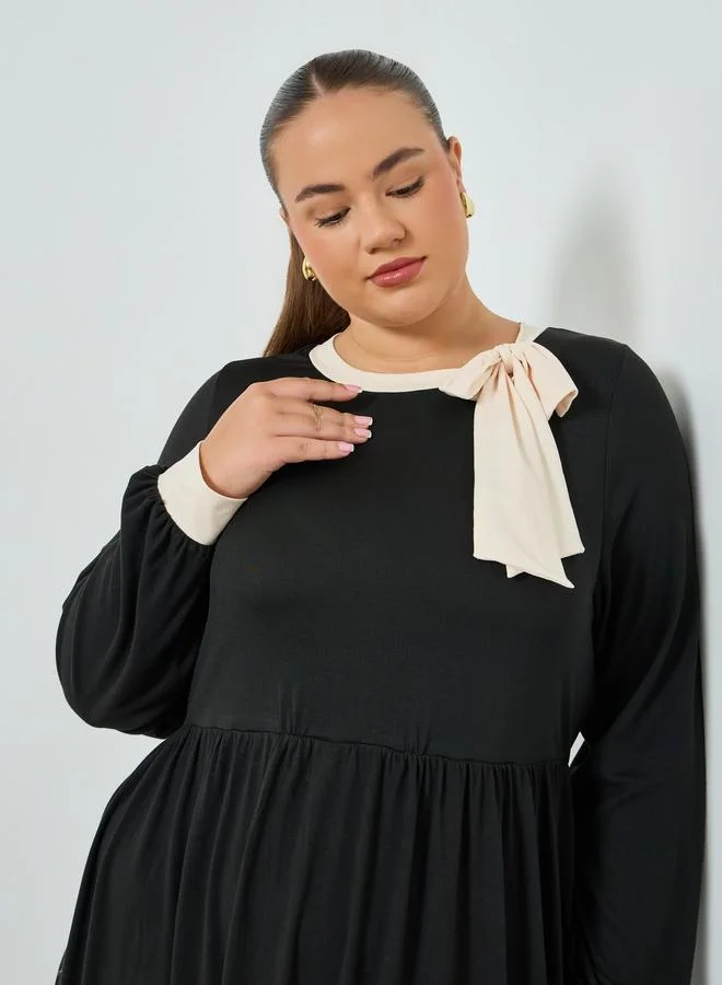 ستايلي فستان طويل مقاس كبير بفيونكة وحافة واسعة