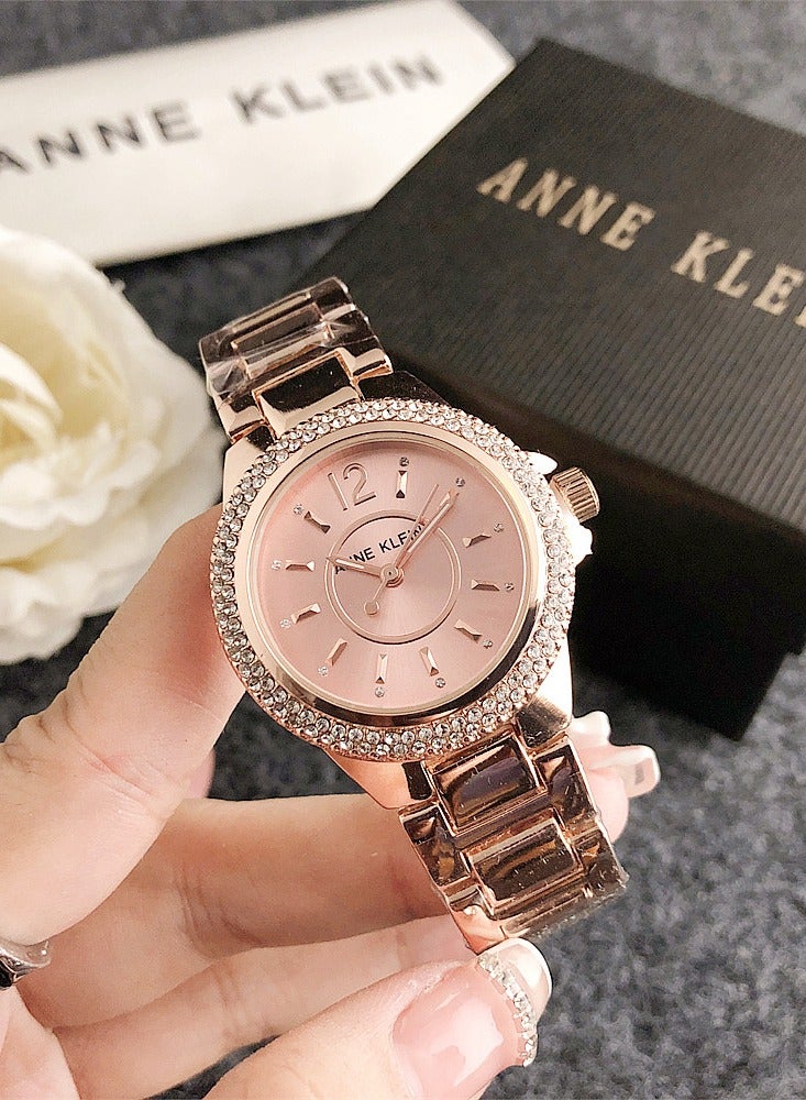 Anne Klein Women's Round Cubic Zirconia Rose Gold Fashion Watch with Rose Gold Stainless Steel Strap