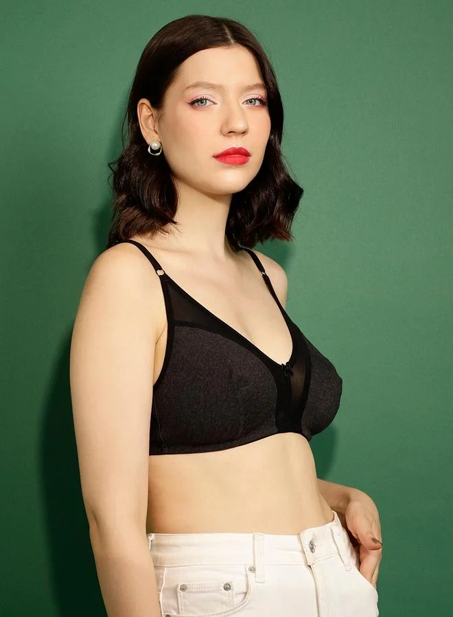 Clovia  Black Solid Non-Padded Non-Wired Powernet Panel Bra for Women | Best Price UAE