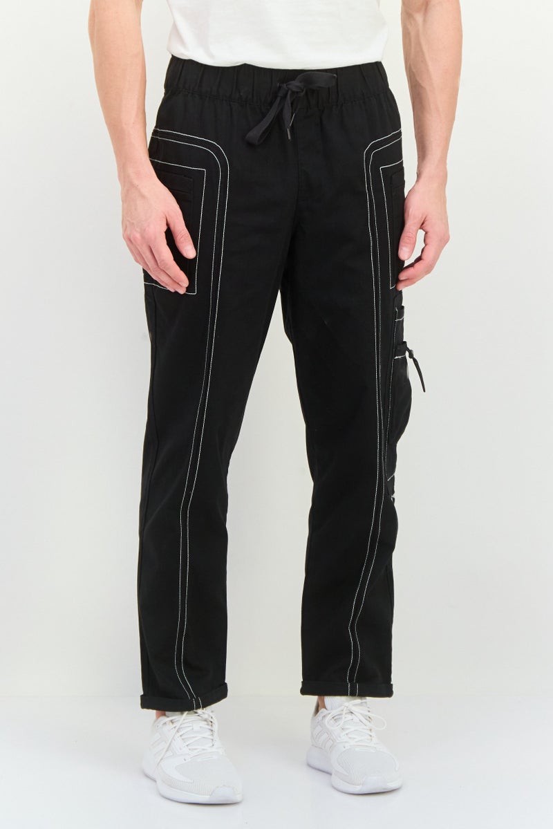 PUMA Men Sportswear Fit Outdoor Track Pant, Black - Image 1