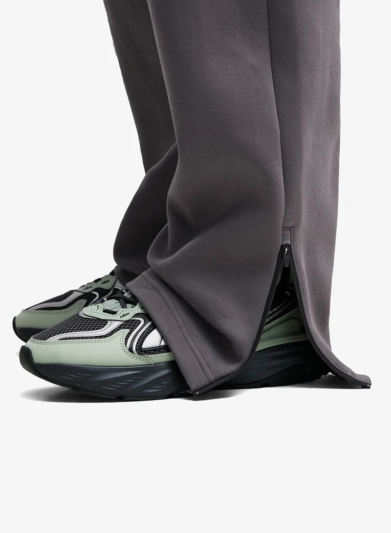 Puma Moody Gray Tech Oversized Sweatpants for Men | Best Price UAE